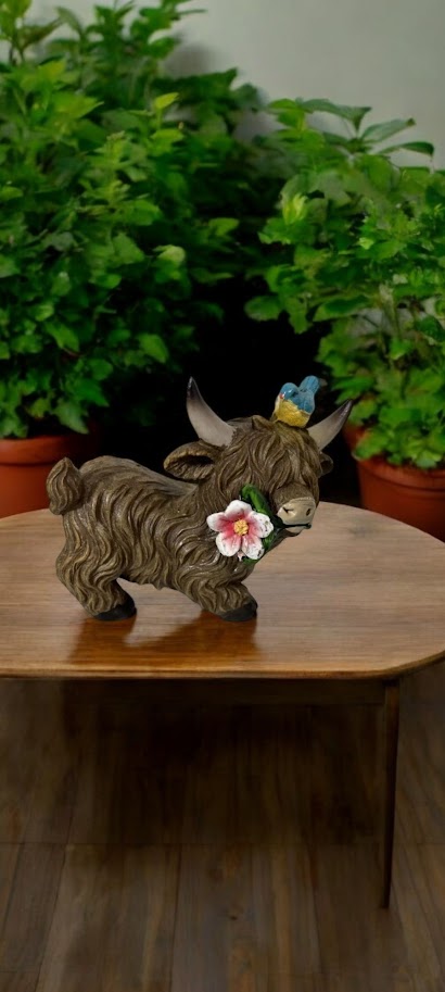 Highland Cow with Pink Flower